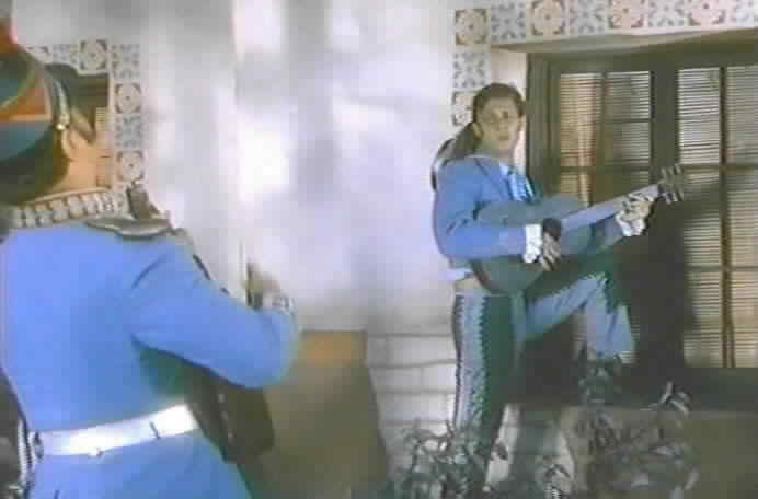 Don Diego helps the commandante serenade Isabella.