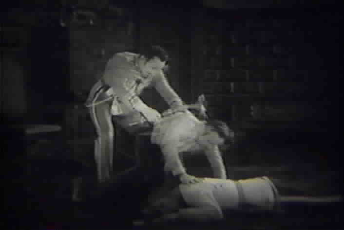 Don Sebastian knocks Don Cesar unconscious.