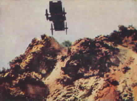 The wagon carrying Rita and Zorro goes over the edge of a cliff.