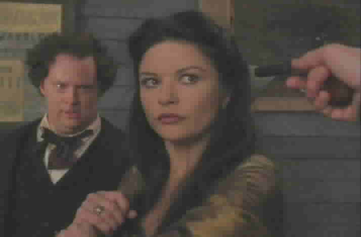 Elena is confronted by Pike and Harrigan.