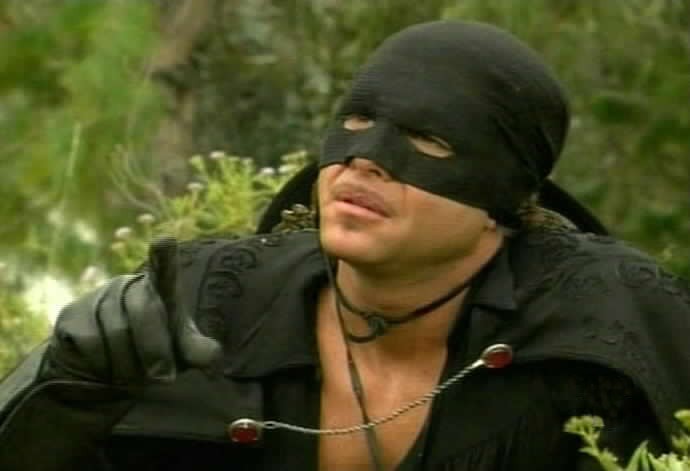 Zorro is amazed that Esmeralda is spending a pleasant day with the gypsies who kidnapped her.