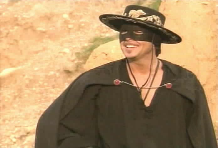 Zorro laughs as he eludes his pursuers.