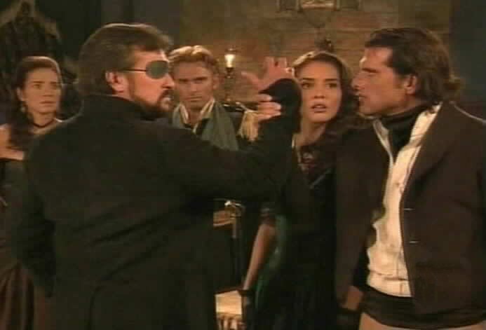 Diego keeps Fernando from striking Esmeralda.