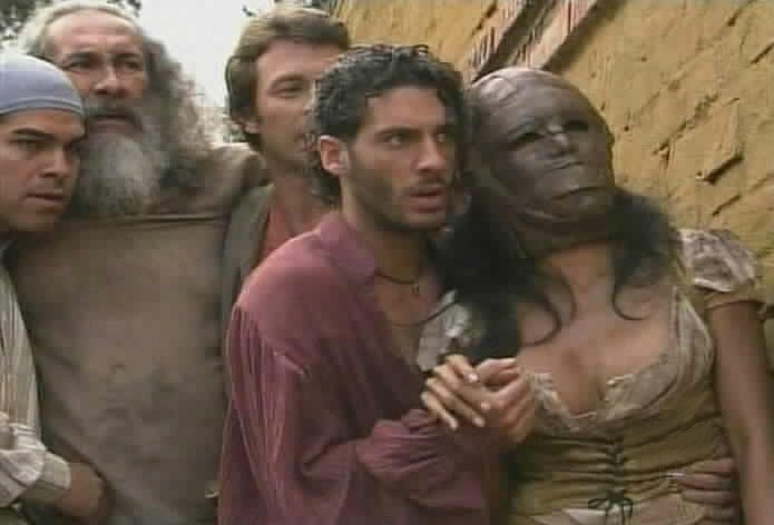 Renzo leads Sara Kali from the prison.