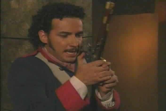 Aguirre prepares to defend Esmeralda with his life.