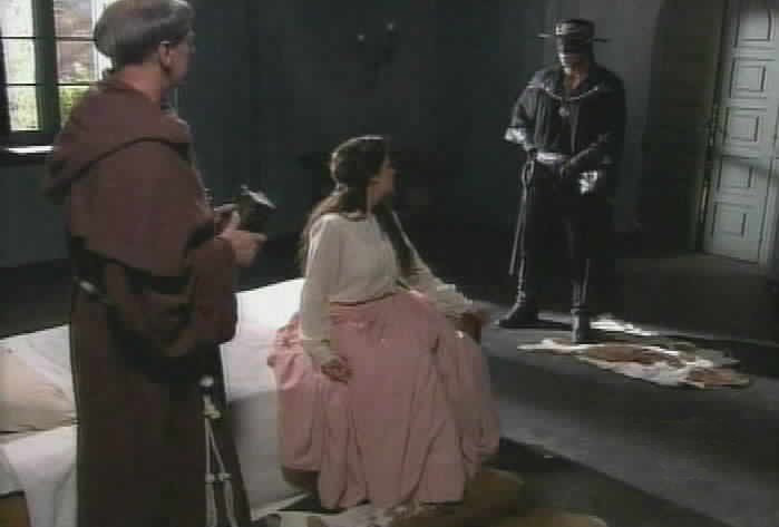 Zorro warns Padre Tomas and Sara Kali of Montero's presence.