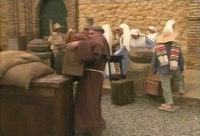 Padre Tomas and the nuns build a barricade.