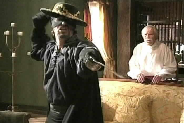 The sight of Tobias as Zorro literally frightens Samaniego to death.