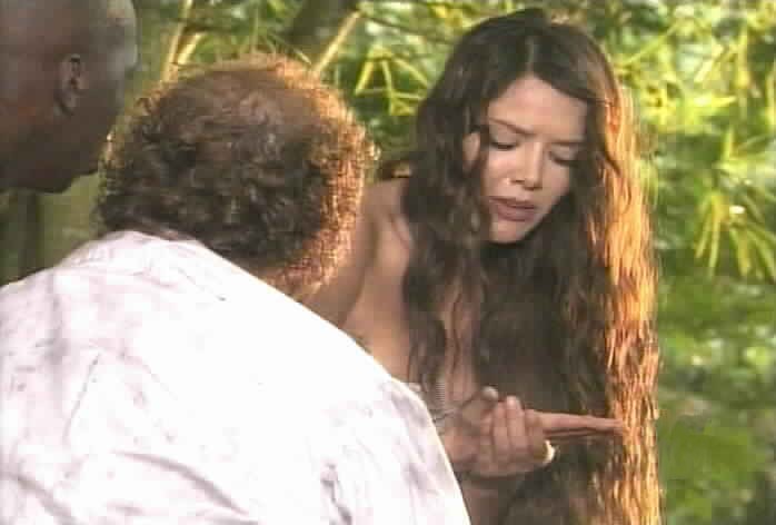 Esmeralda shows her burned palm to Garcia.