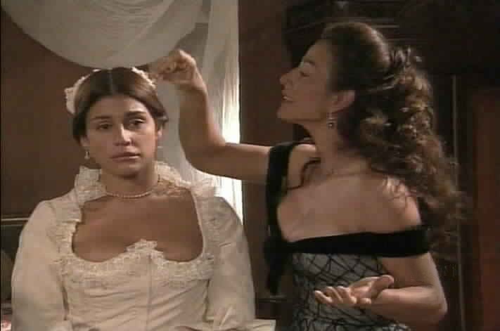 Almudena helps an unenthusiastic Maria Pia get ready for her wedding.