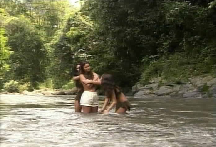 Esmeralda is bathed in the river.