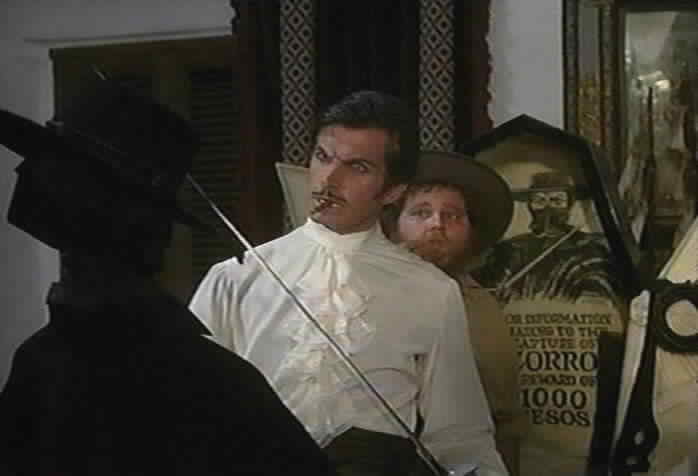 Diego pulls the Zorro disguise out of the casket.