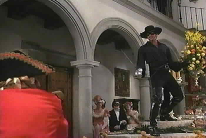 Zorro fights Esteban during the ball.